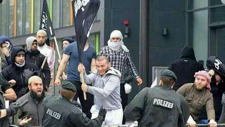 ISIS supporters are taken down in the Netherlands in August 2014.
